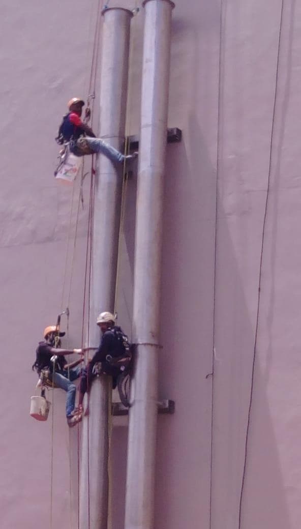 Scavenger Holdings rope-access technicians working at height
